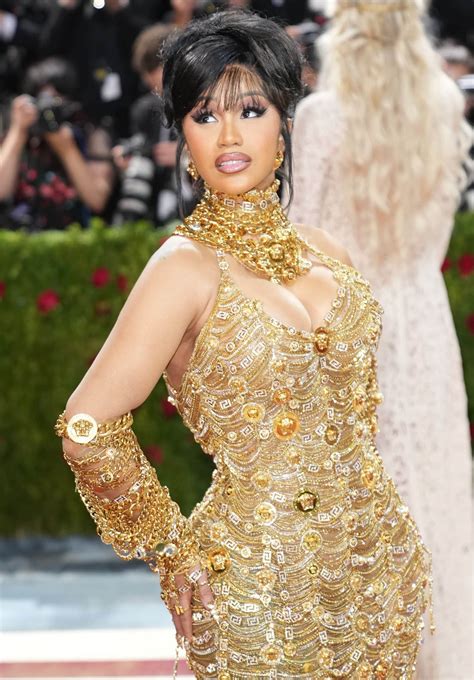 cardi b versace dress cost|cardi b gold dress.